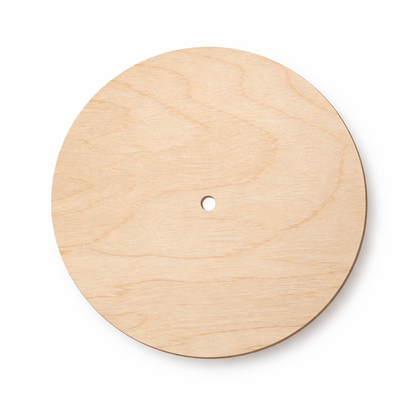 Round wooden clock face made from 3mm birch plywood with centre hole
